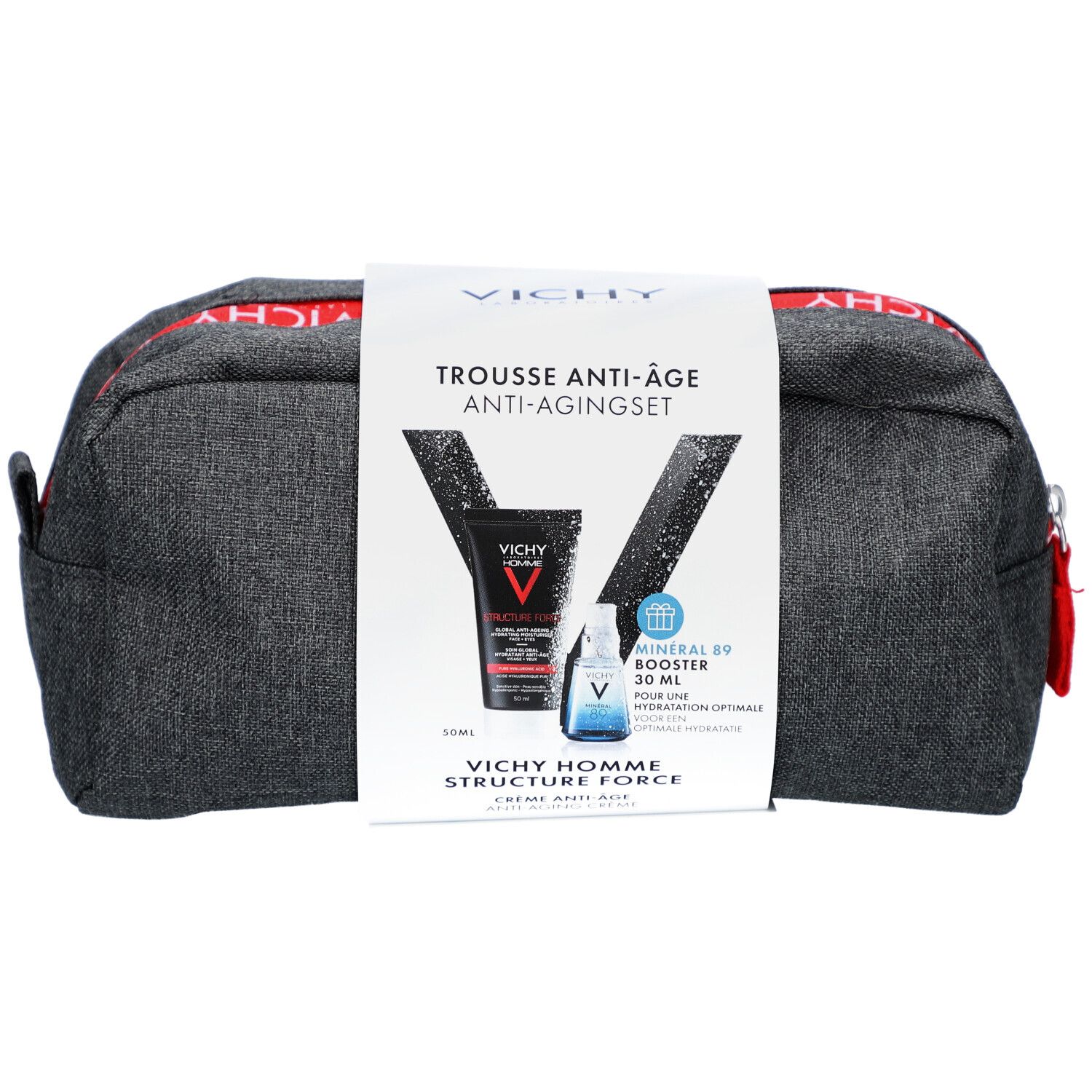 Trousse de toilette grise avec fermeture éclair rouge et logo Vichy. Emballage avec noms et images de produits.