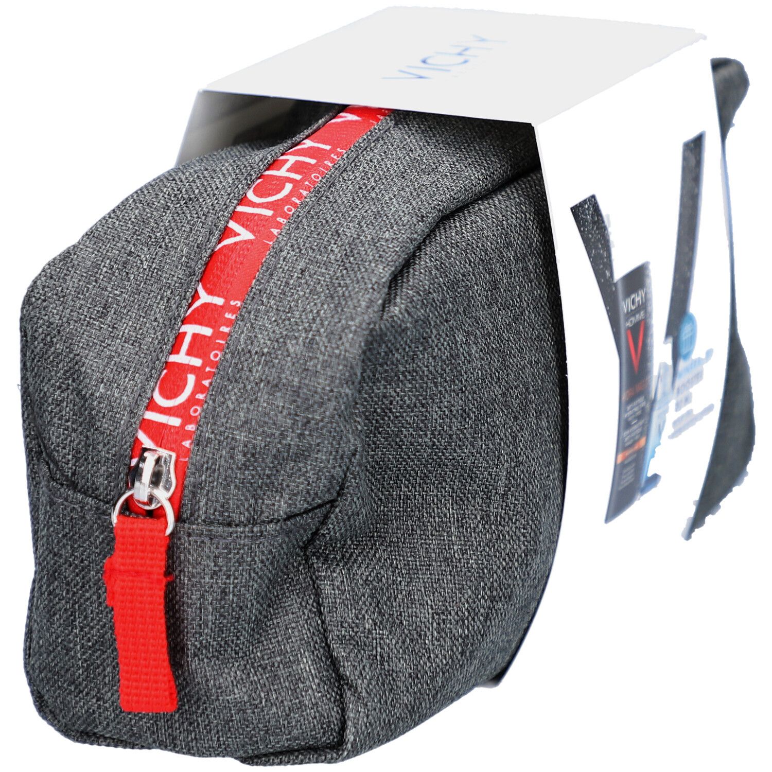 Trousse de toilette grise avec fermeture éclair rouge et encart blanc. VICHY est écrit sur la fermeture éclair.