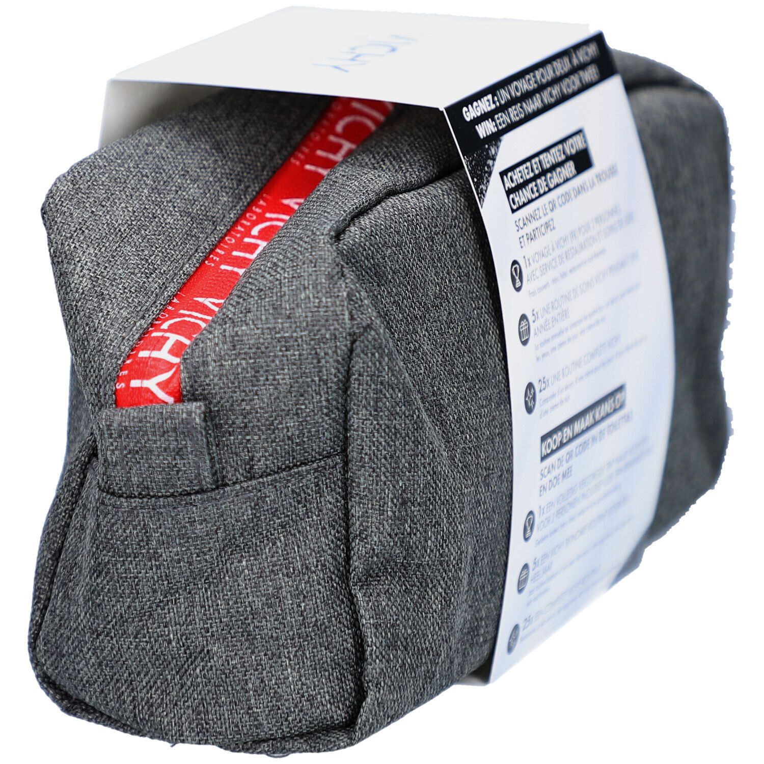 Trousse de toilette grise avec fermeture éclair rouge et encart blanc. Texte en français et néerlandais sur l'encart.