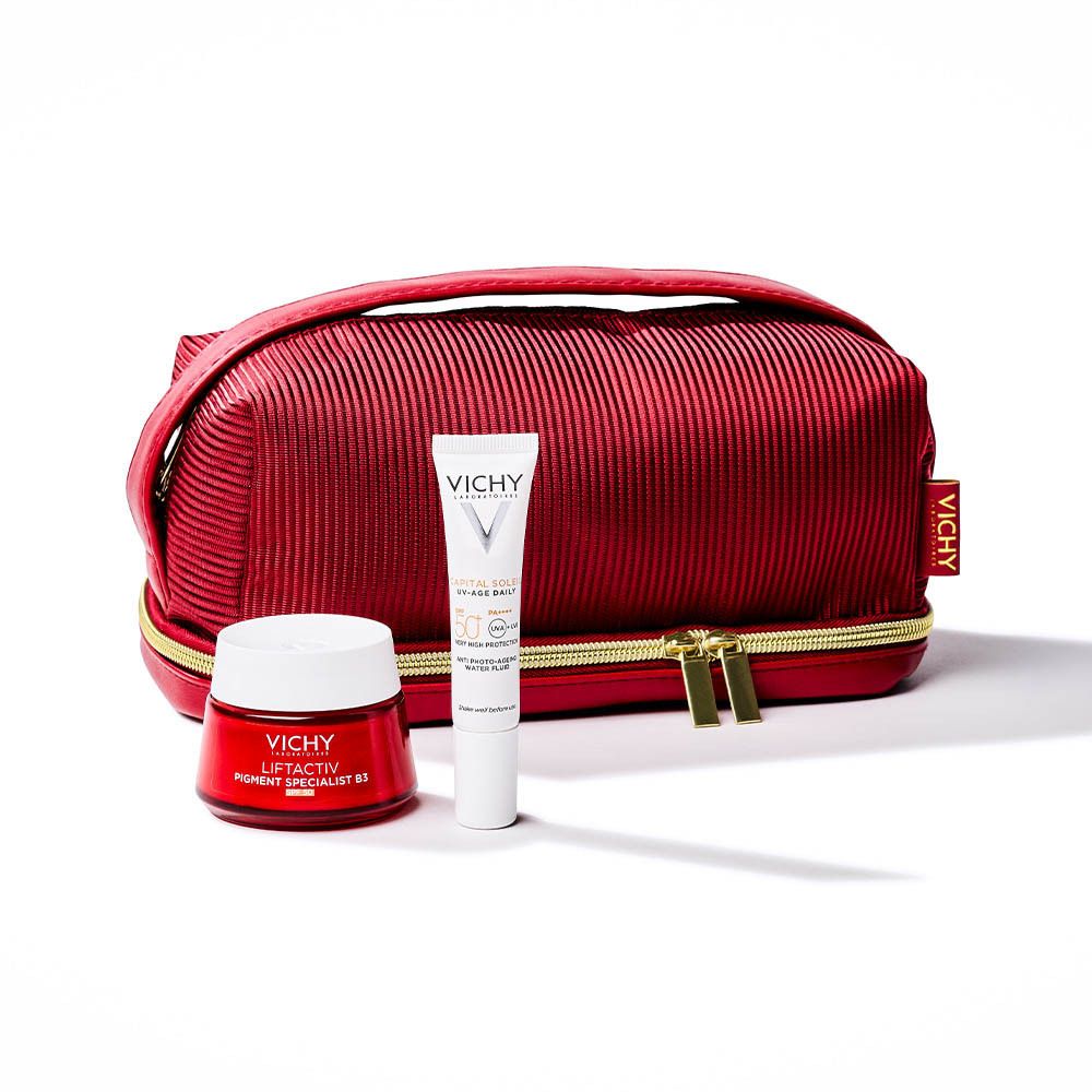 Trousse de maquillage rouge avec fermeture éclair dorée et poignée. Deux produits et emballage.