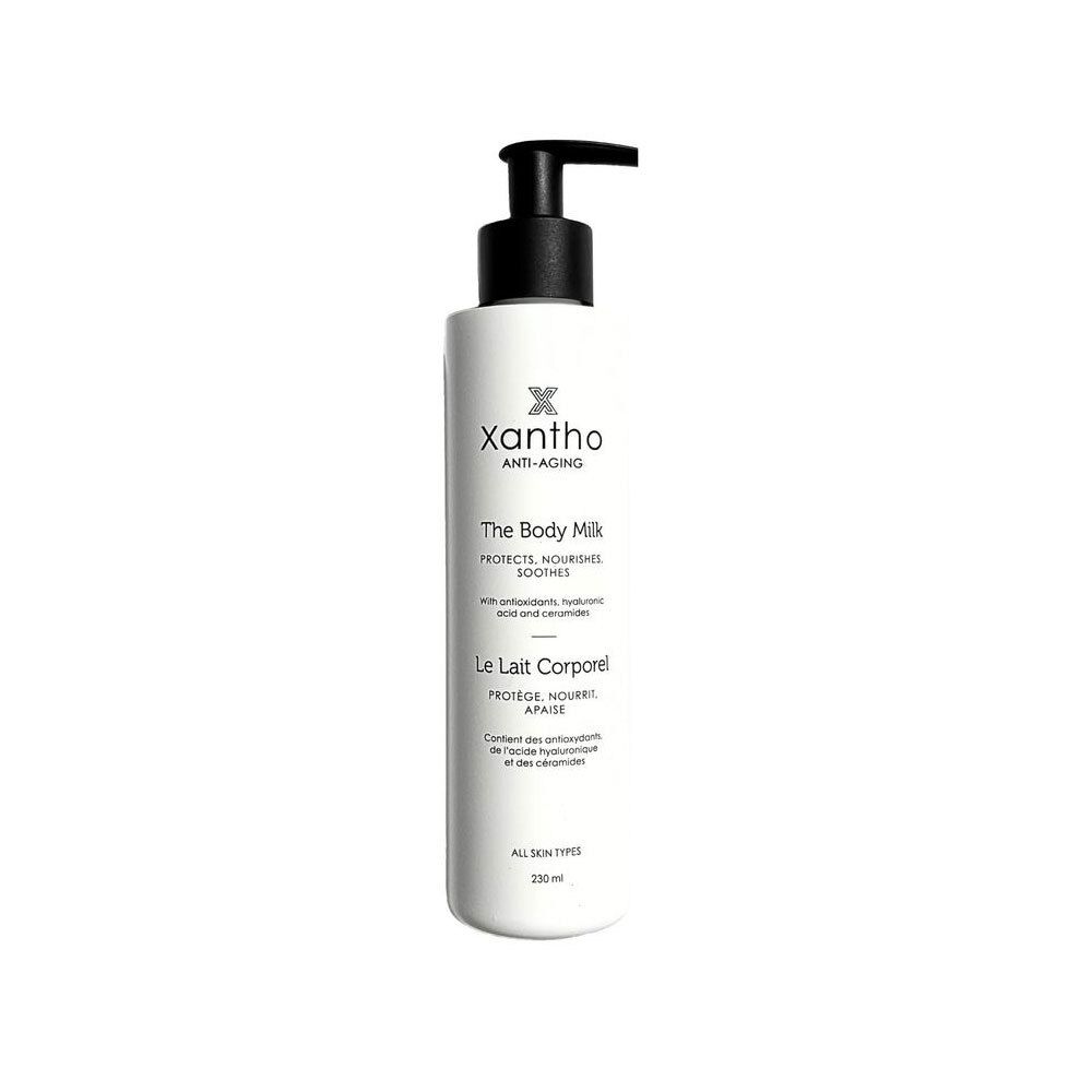 Witte fles met zwarte pomp. Opschrift: Xantho Anti-Aging, The Body Milk, Le Lait Corporel. 230 ml.