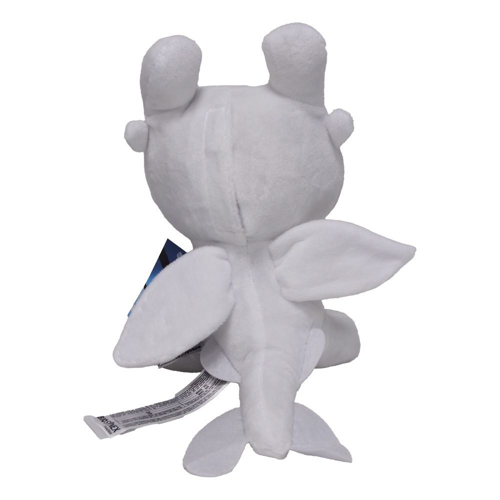 Achteraanzicht van het witte pluche dier. Vleugels, staart, oren zichtbaar. Label op de rug.