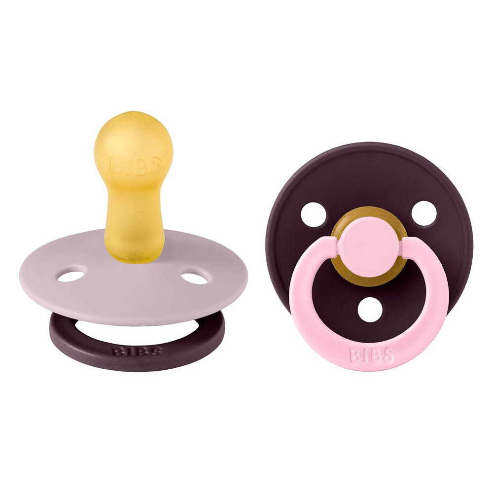 Twee fopspenen. Lila speen, donkerbruin schild, roze ring. Merk BIBS.