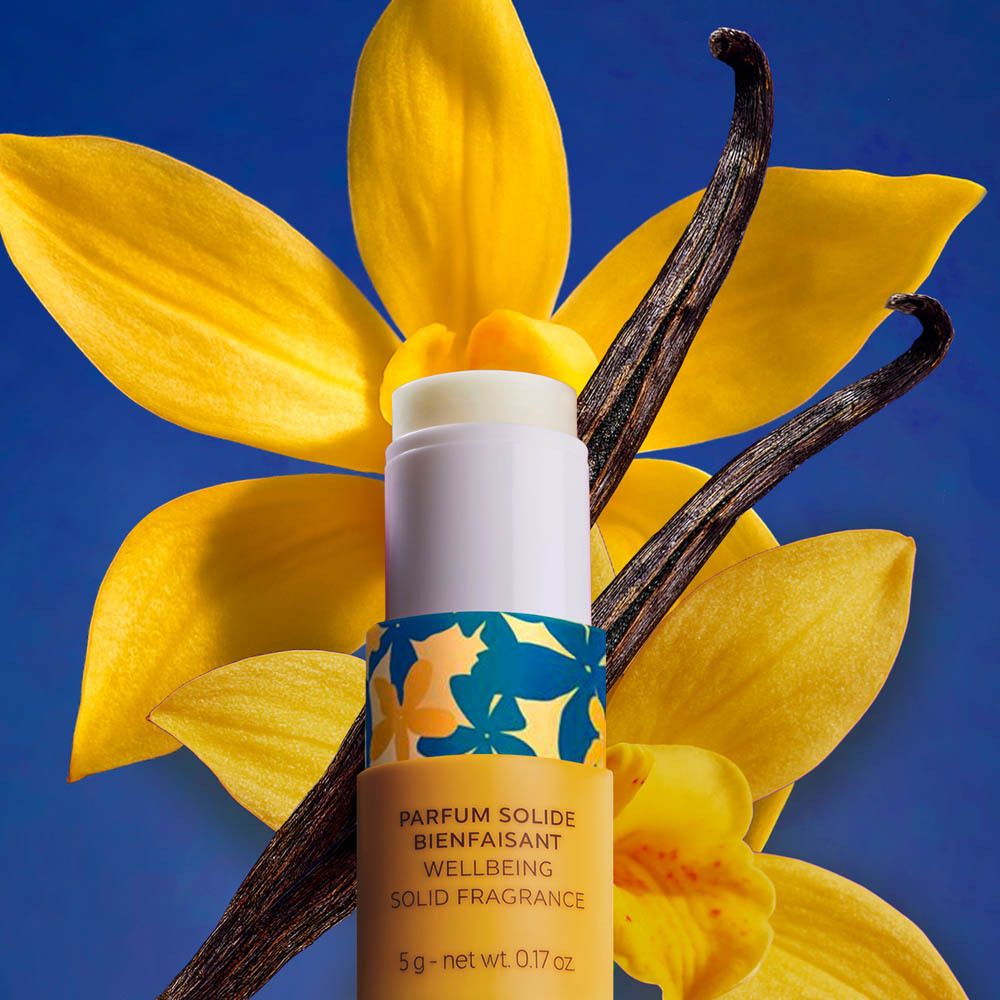 Product met vanillebloemen en vanillestokjes. Opschrift: Jasmijn, Vanille, Zilt, Ylang Ylang, Gourmand, Tonkaboon.