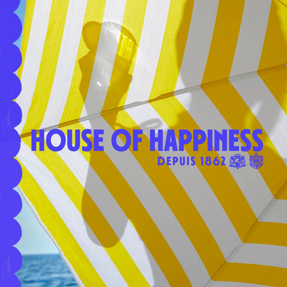 Parasol avec produit. Inscription: House of Happiness, Depuis 1862.