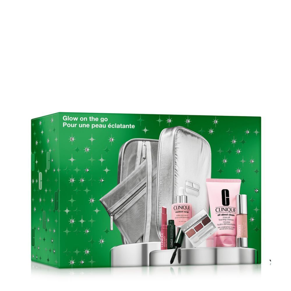 Zilveren make-uptas met cosmetica. Bevat serum, reinigingsschuim, mascara, oogschaduw, lippenstift en meer.