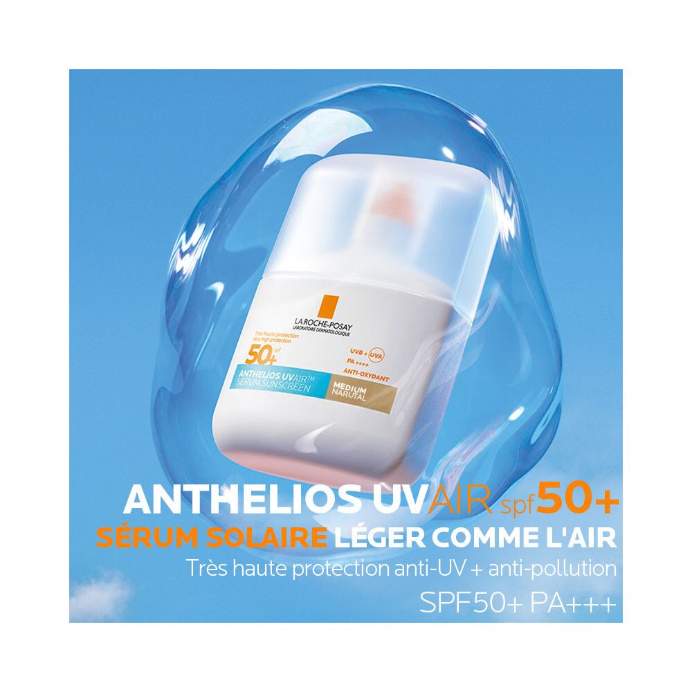 La Roche-Posay Anthelios UVAIR Sérum Solaire SPF50+ dans une bulle bleue. Produit avec détails bleus et bruns.