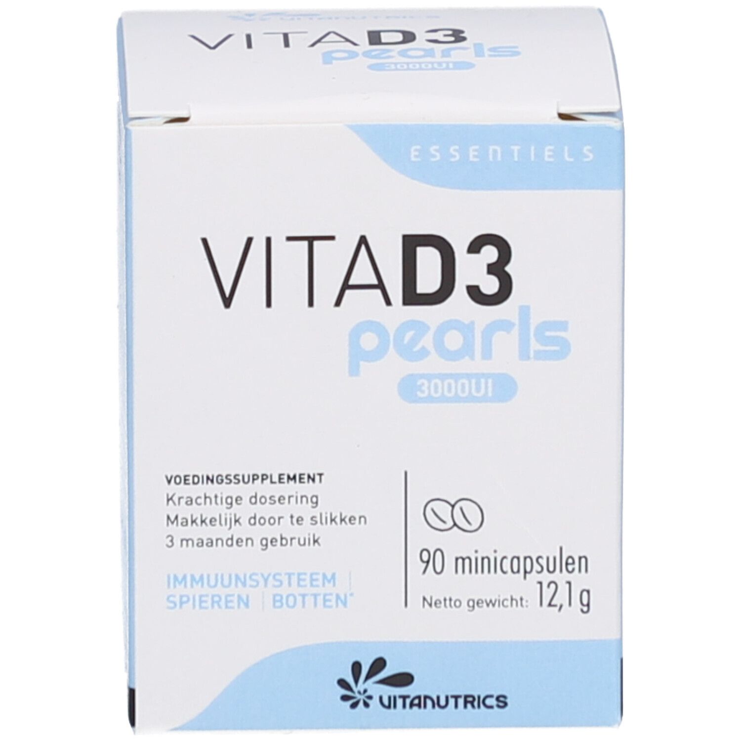Witte doos met tekst: VITA D3 pearls 3000UI. 90 Minicapsules. Voedingssupplement. Vitanutrics logo. Essentiëls.