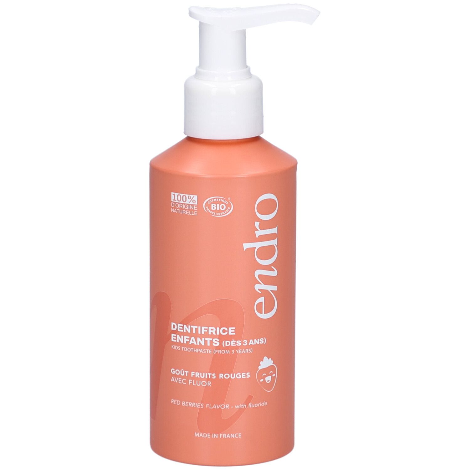 Rode tandpasta fles met witte pomp. Opschrift: endro, Dentifrice Enfants, Gout Fruits Rouges, avec Fluor. Bio-certificering.