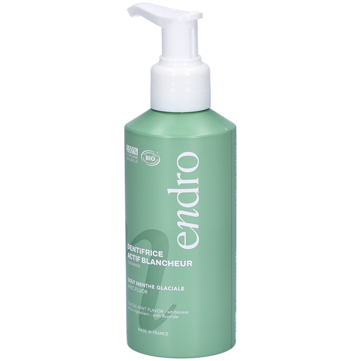 Groene fles met witte pomp. Opschrift: Endro, Dentifrice Actif Blancheur, Goût Menthe Glaciale. Bio-certificering.