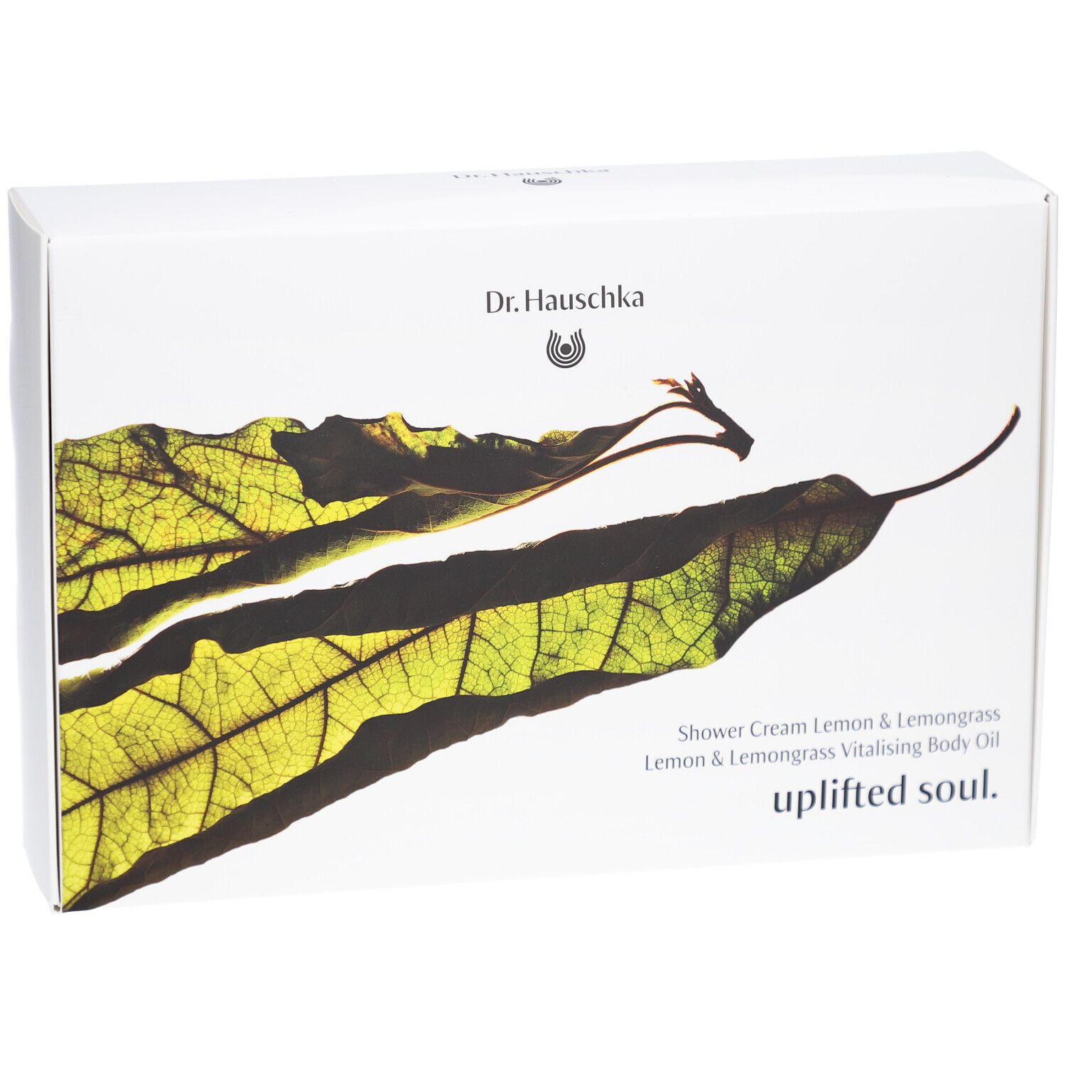 Witte doos met bladmotief en tekst. Bevat: Shower Cream Lemon & Lemongrass, Uplifted Soul.