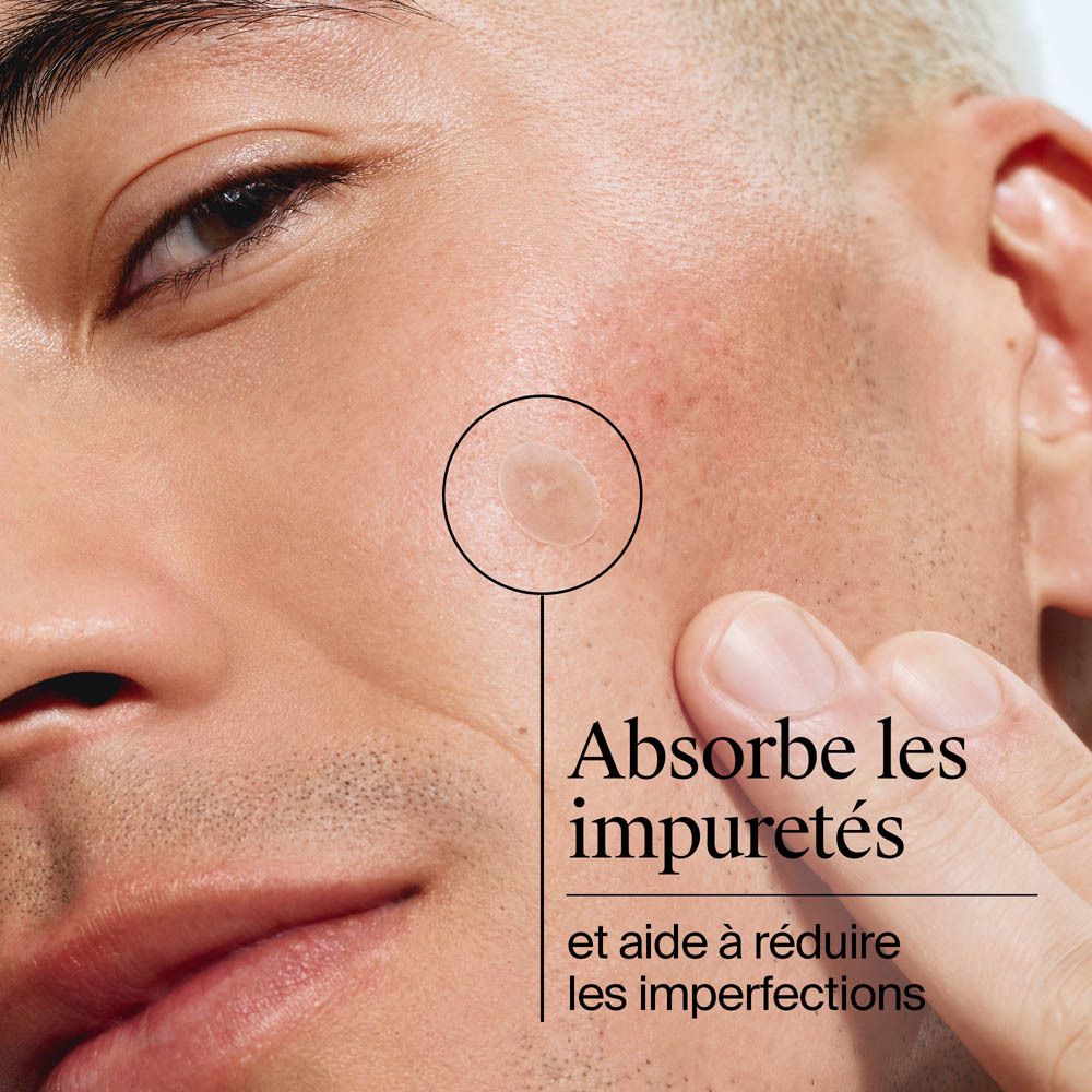 Visage d'un homme. Un patch sur la peau. Texte : Absorbe les impuretés.