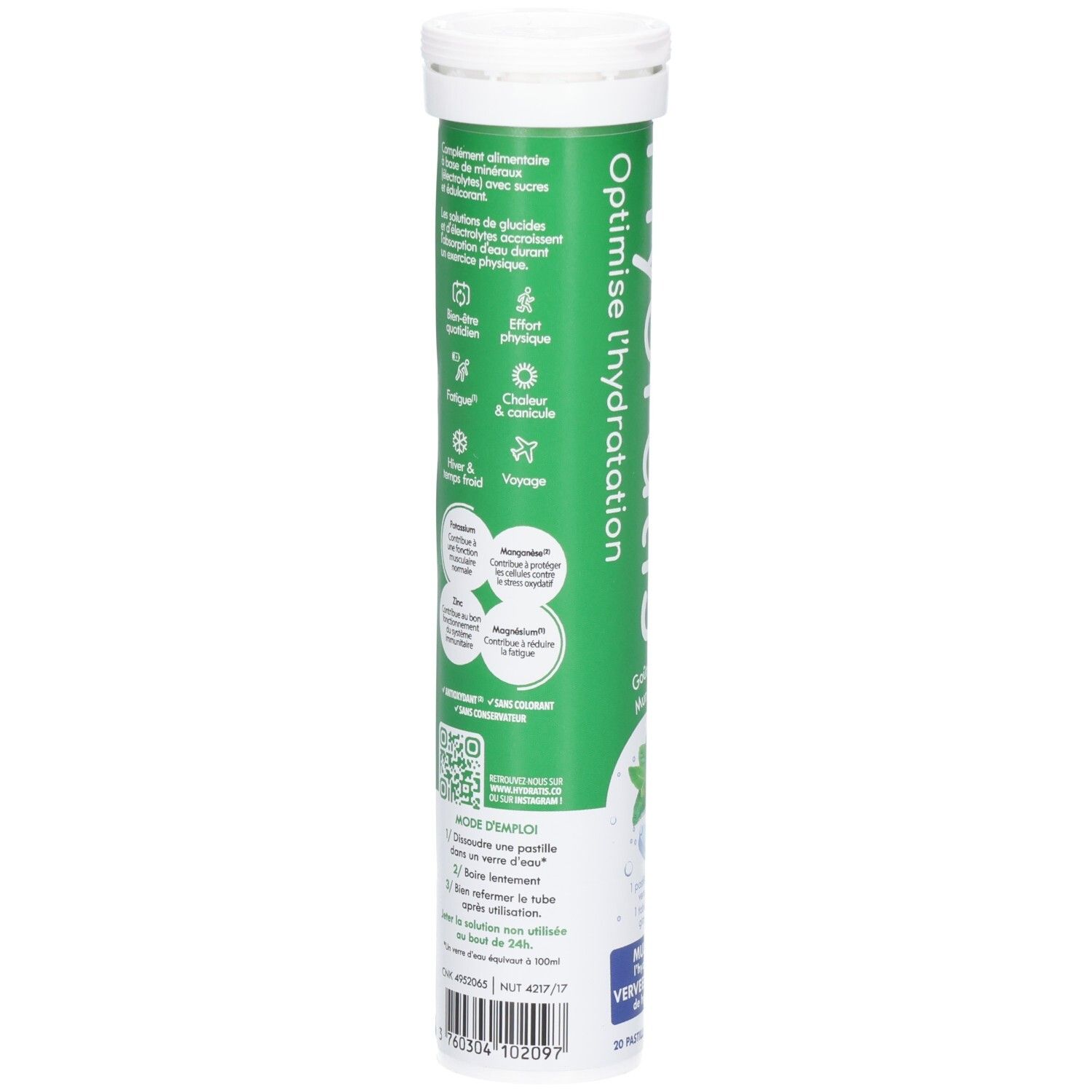 Tube vert et blanc avec informations produit. Contient des informations sur les ingrédients et l'utilisation. Code QR.