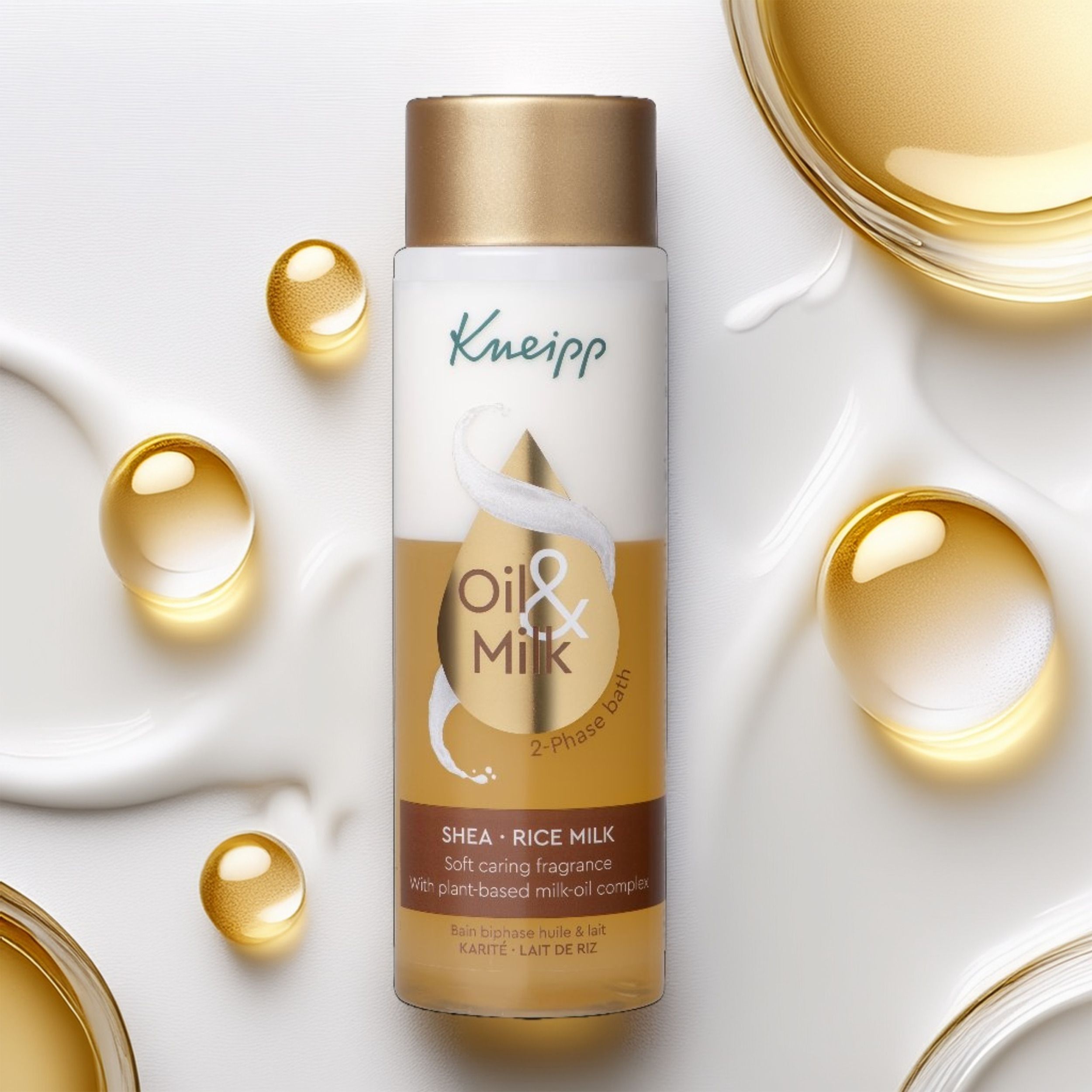 Bain Kneipp Huile & Lait 2 phases. Flacon avec bouchon doré. Inscription: Shea Rice Milk. Parfum doux. Complexe huile-lait végétal.