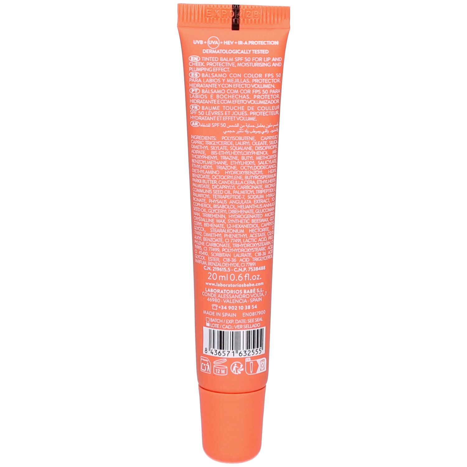 Achterkant van de lip- en wangbalsem tube. Bevat meertalige tekst, ingrediënten en barcode. Oranje.