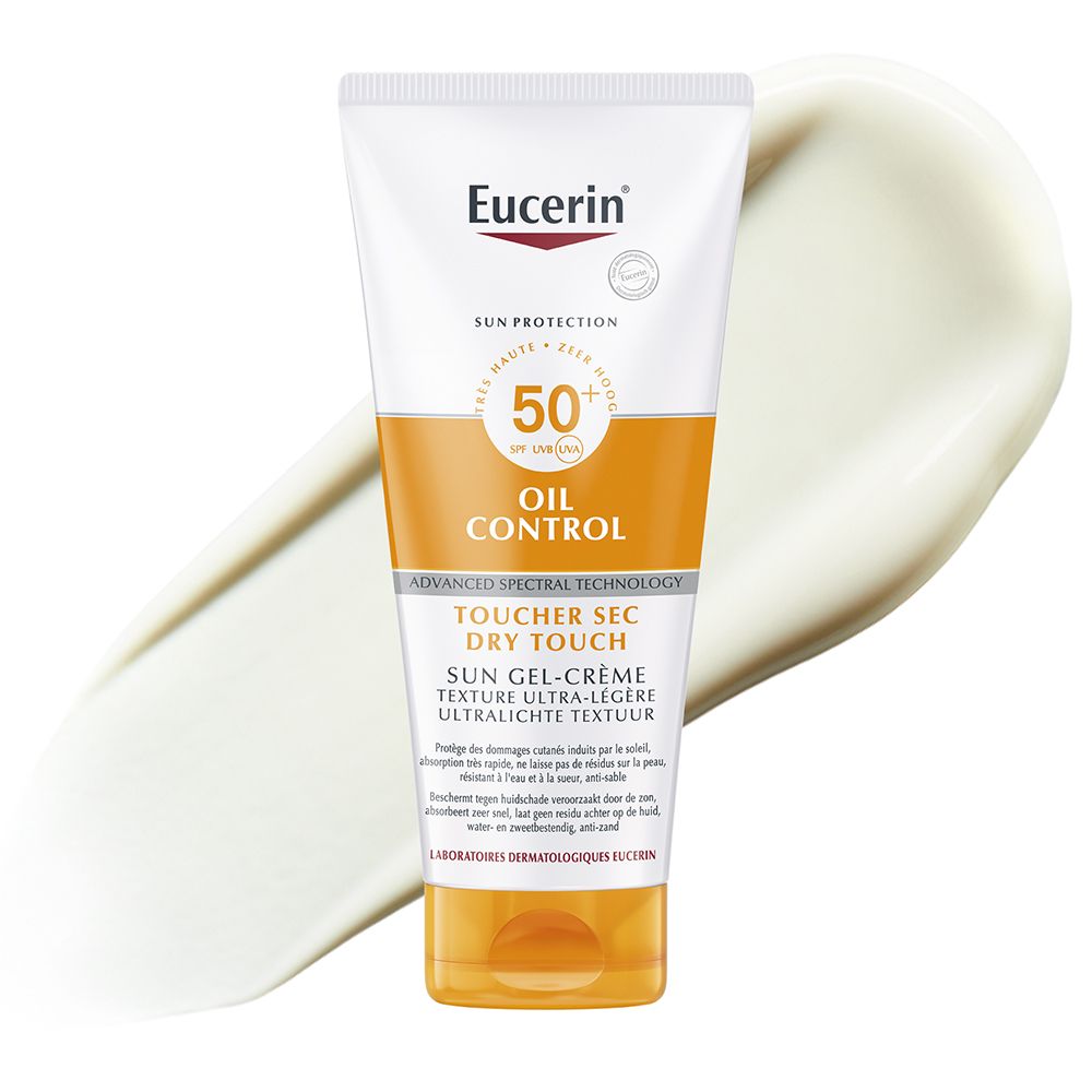 Tube blanche et orange. À côté, une trace de crème. Inscriptions: Eucerin, Sun Protection, 50+ SPF, Oil Control.