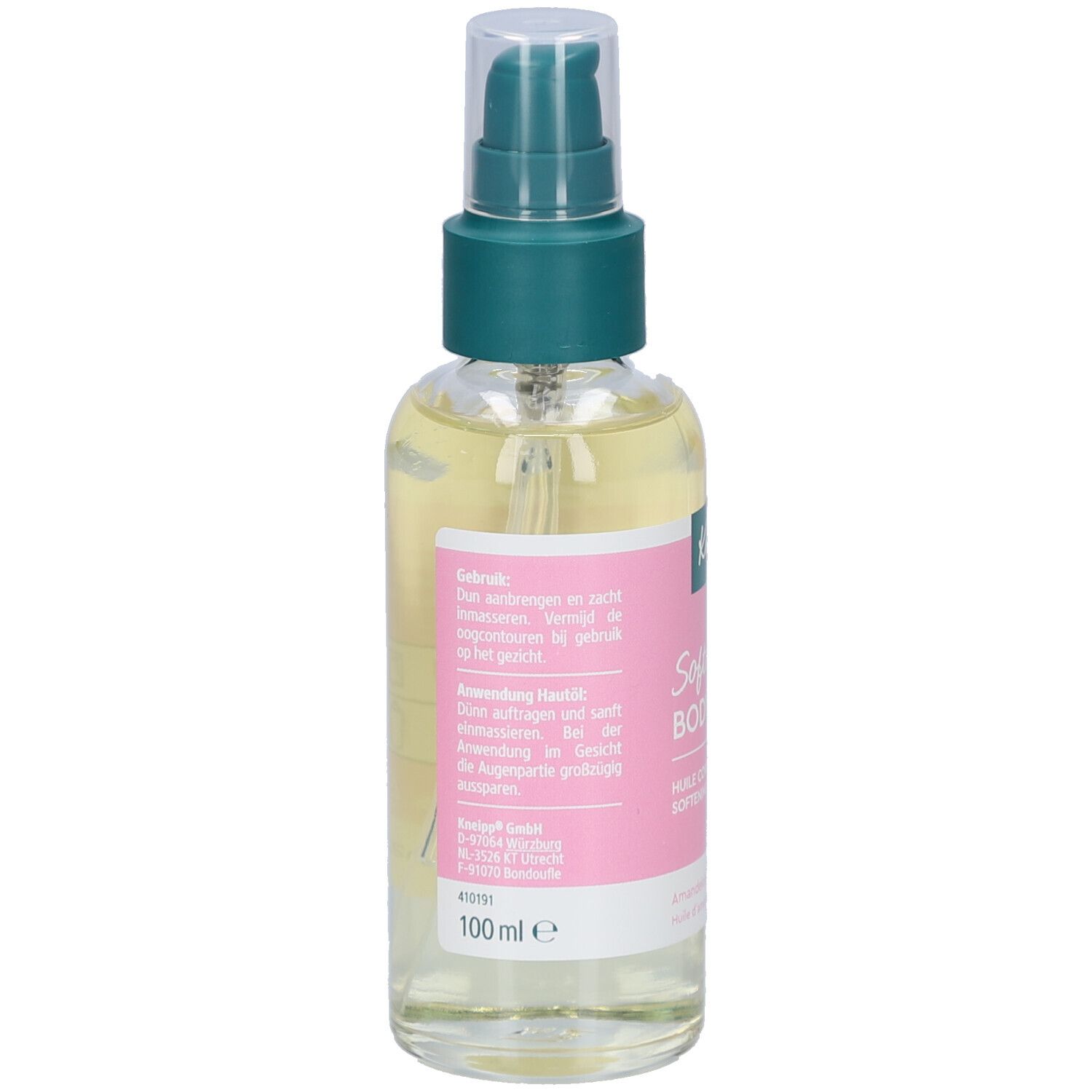 Achterkant van de body oliefles. Roze etiket met tekst en informatie. Heldere vloeistof zichtbaar.