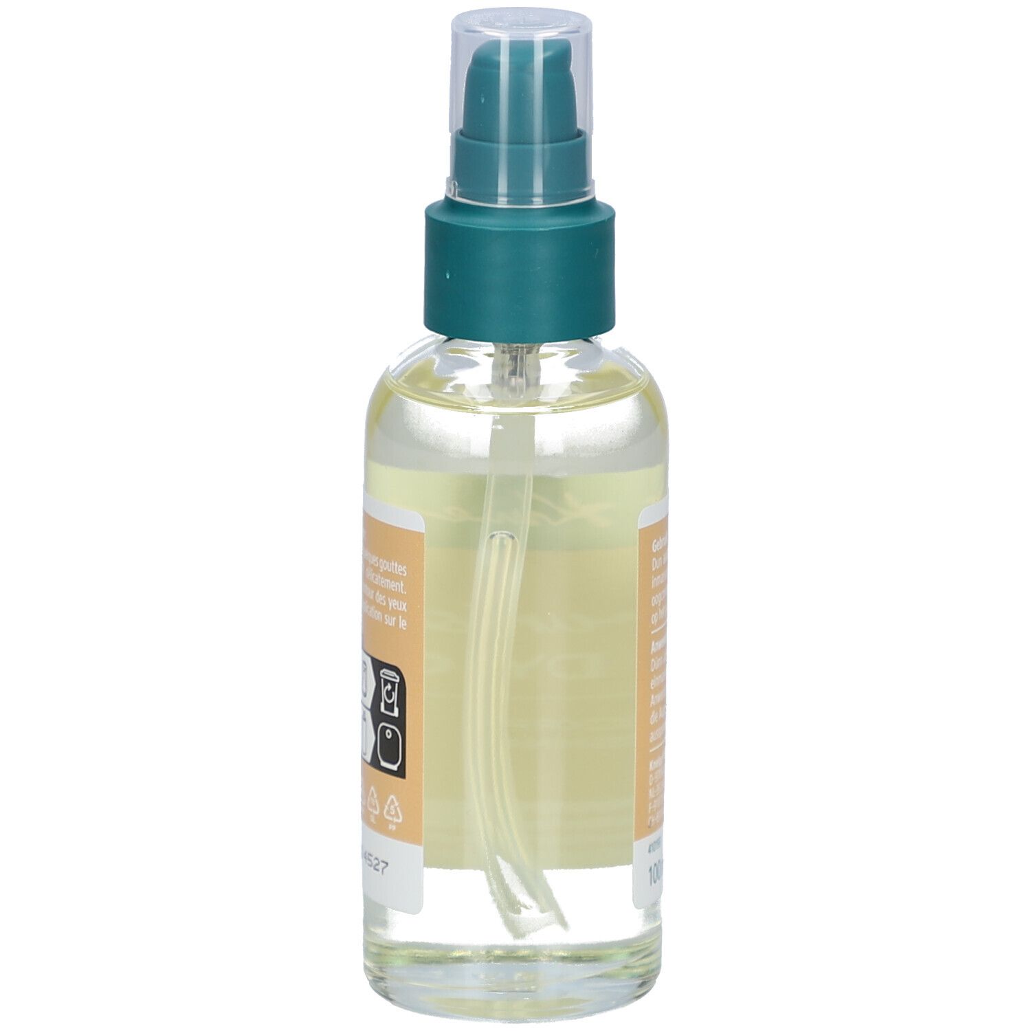 Côté du flacon Kneipp Nourishing Body Oil. Étiquette avec informations produit et symboles. Liquide transparent visible.