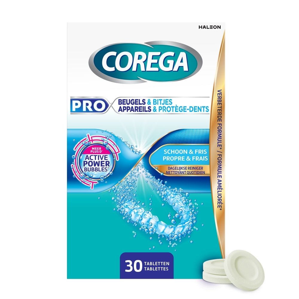 Corega Pro tabletten. Opschrift: Beugels & Bitjes, Appareils & Protège-dents. 30 tabletten. Witte tabletten.
