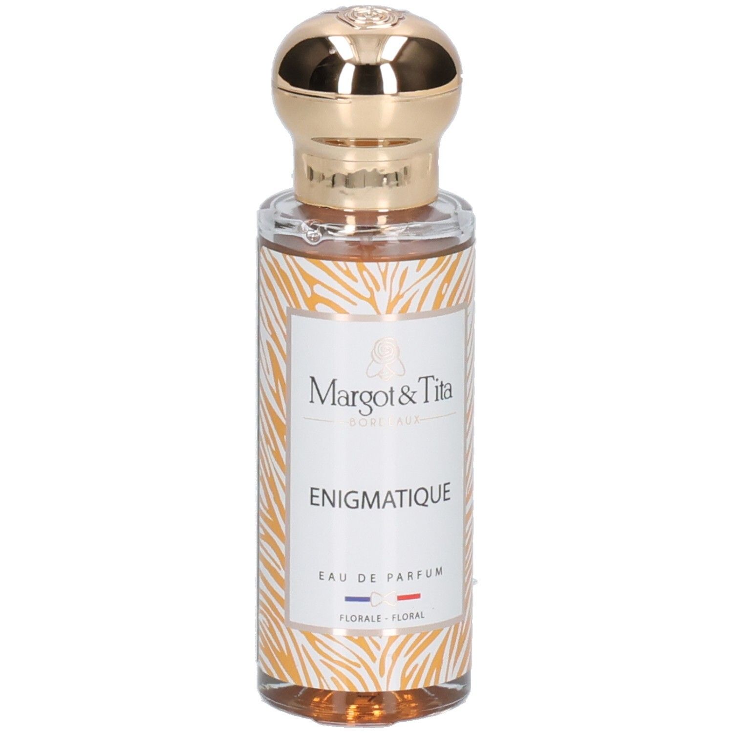 Margot & Tita Énigmatique Eau de Parfum in glazen fles met gouden dop en dierenprint.