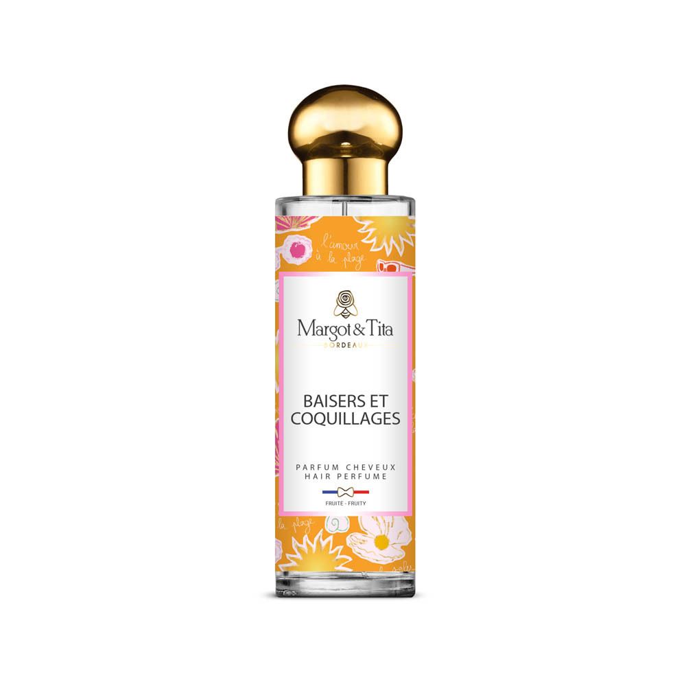 Haarparfum in glazen fles met gouden dop. Oranje label met schelpen en bloemen.