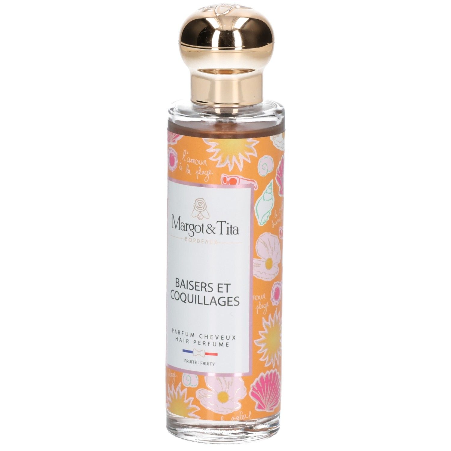 Haarparfum in glazen fles met gouden dop. Oranje label met schelpen en bloemen.