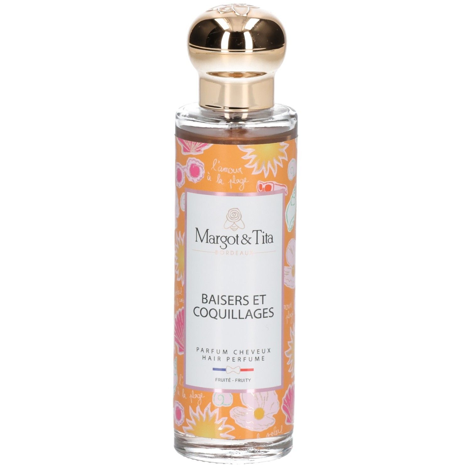 Haarparfum in glazen fles met gouden dop. Oranje label met schelpen en bloemen.