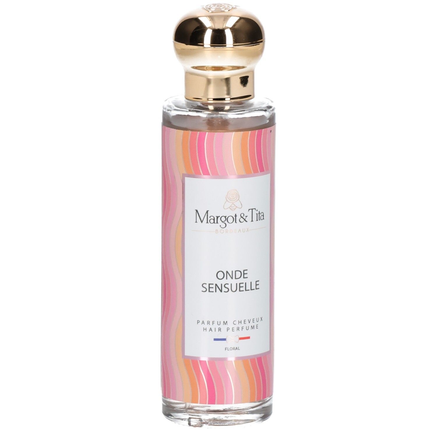 Flacon de parfum avec bouchon doré. Inscription: Onde Sensuelle, Parfum Cheveux. Marque: Margot & Tita.