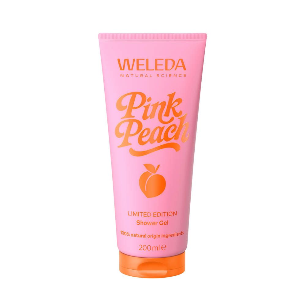 Tube rose avec bouchon orange. Inscriptions : Weleda, Pink Peach, édition limitée, gel douche. Illustration de pêche.
