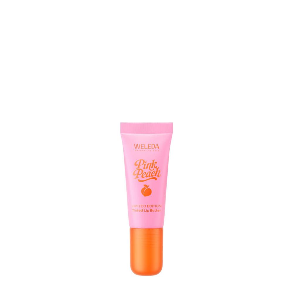 Tube de baume à lèvres rose avec bouchon orange. Inscription: Pink Peach, édition limitée. Contient une illustration de pêche.