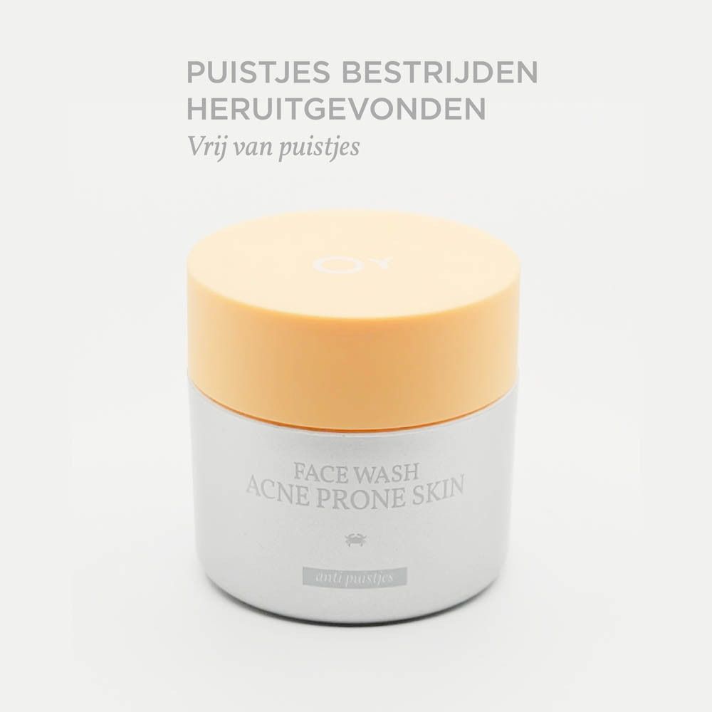 Crèmepot met gele deksel. Opschrift: Face Wash Acne Prone Skin. Tekst: Puistjes bestrijden.