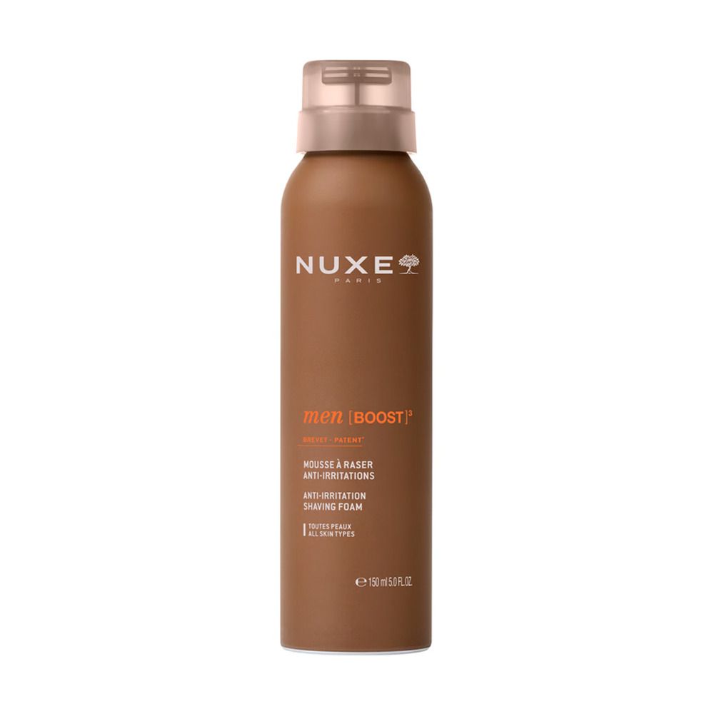 Bruine fles met sproeikop. Opschrift: NUXE, men [BOOST], Mousse à raser, Anti-Irritations, 150 ml.