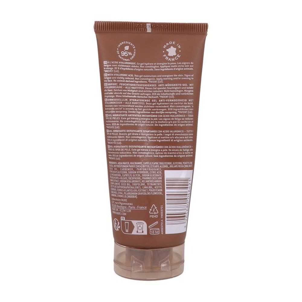 Achterkant van de bruine tube. Meertalige tekst, ingrediënten en barcode. Transparante sluiting.