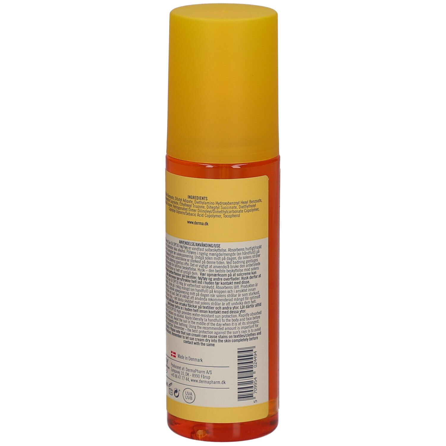 Achterkant van de fles. Tekst met ingrediënten, gebruiksaanwijzing en fabrikantinfo. Vegan-zegel.