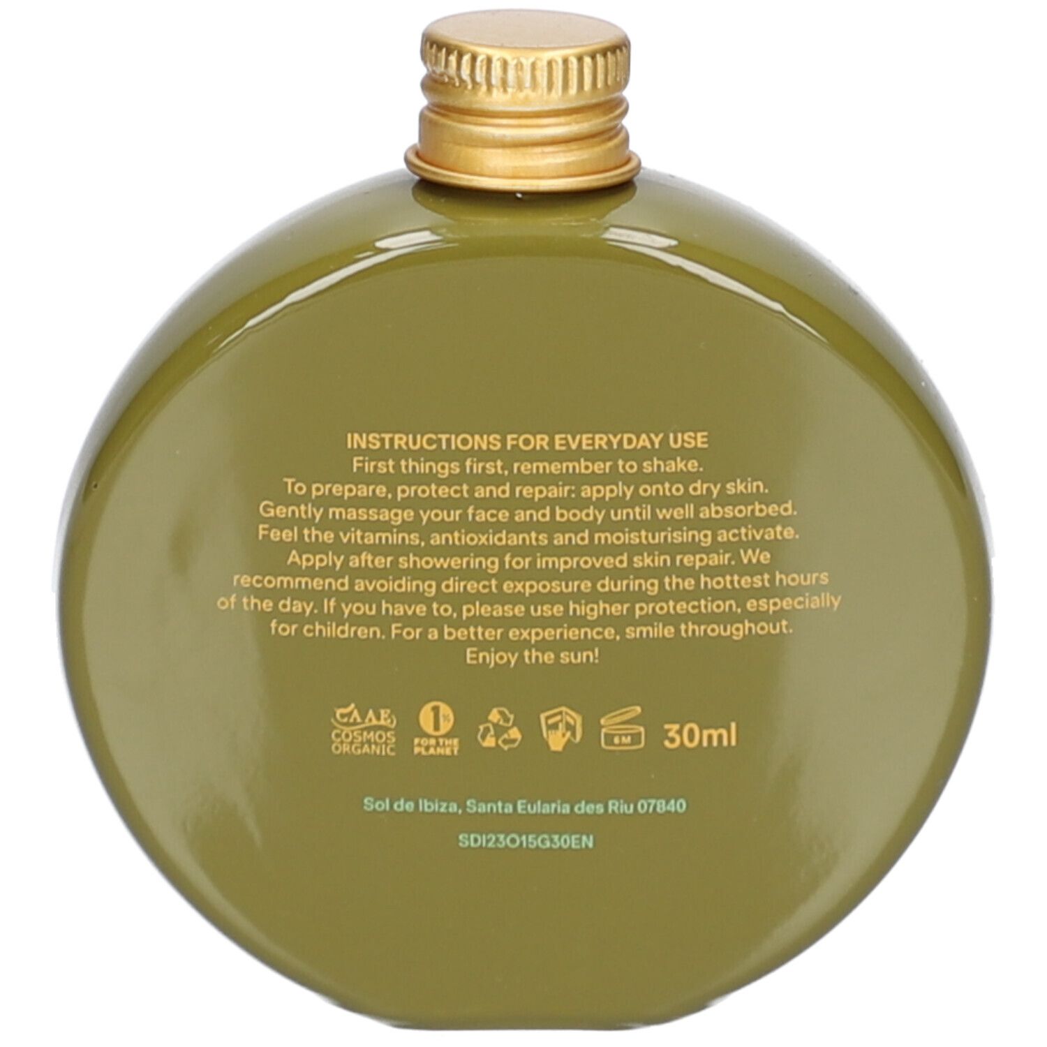 Achterkant van de groene fles. Tekst: gebruiksaanwijzing, ingrediënten, 30ml, logo's.