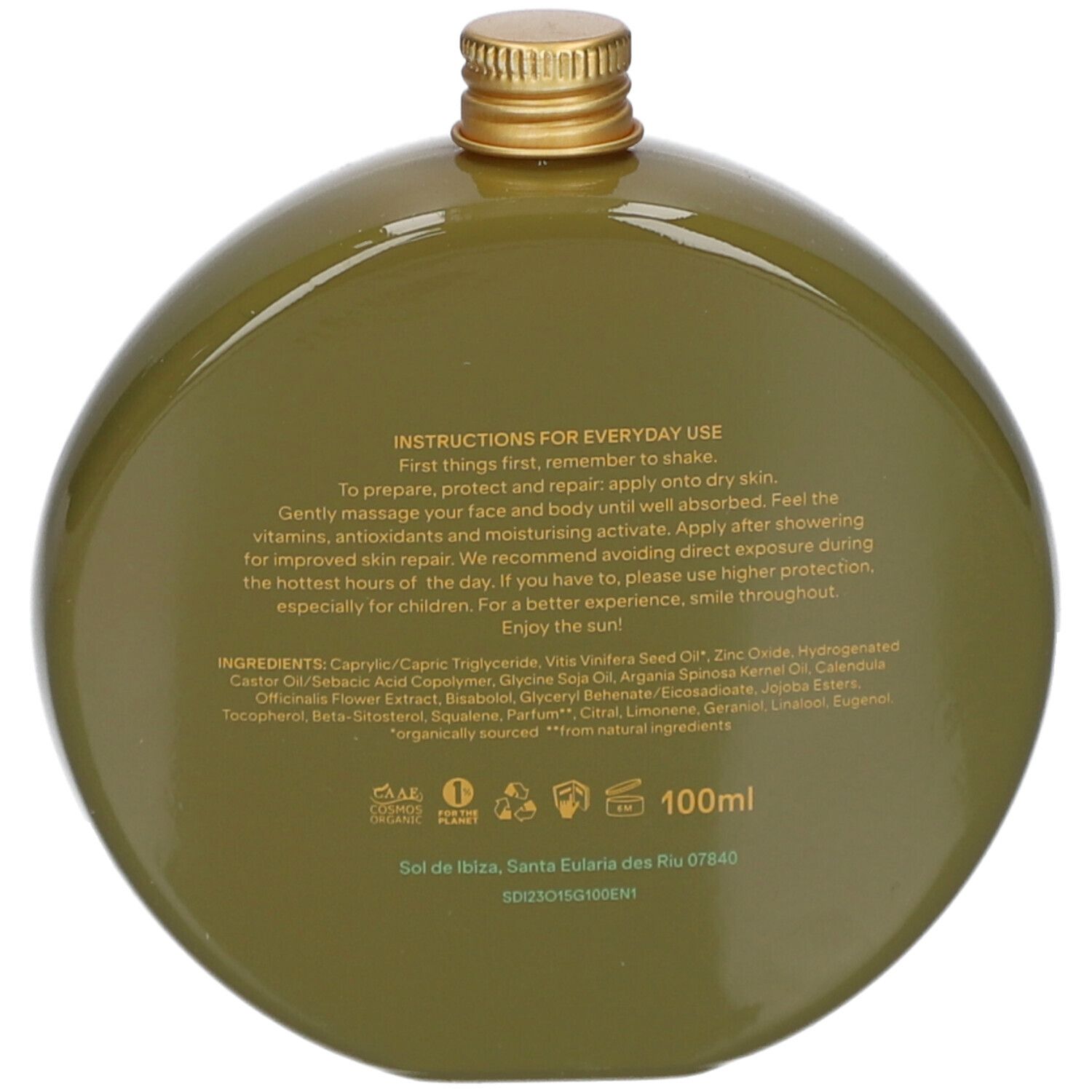 Achterkant van de groene fles. Tekst: gebruiksaanwijzing, ingrediënten, 100ml, logo's en certificeringen.