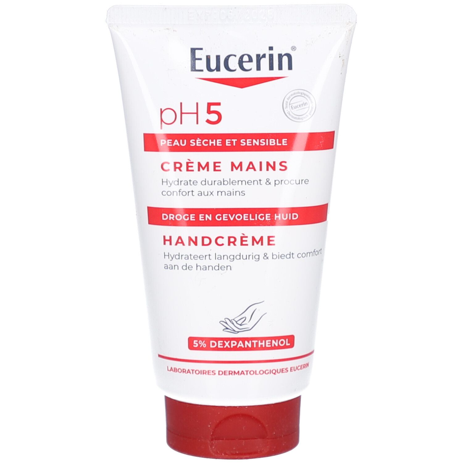 Witte tube met rode dop. Opschrift: Eucerin pH5, Crème Mains, Handcrème. Tekst in het Frans, Nederlands en Engels. 5% Dexpanthenol.