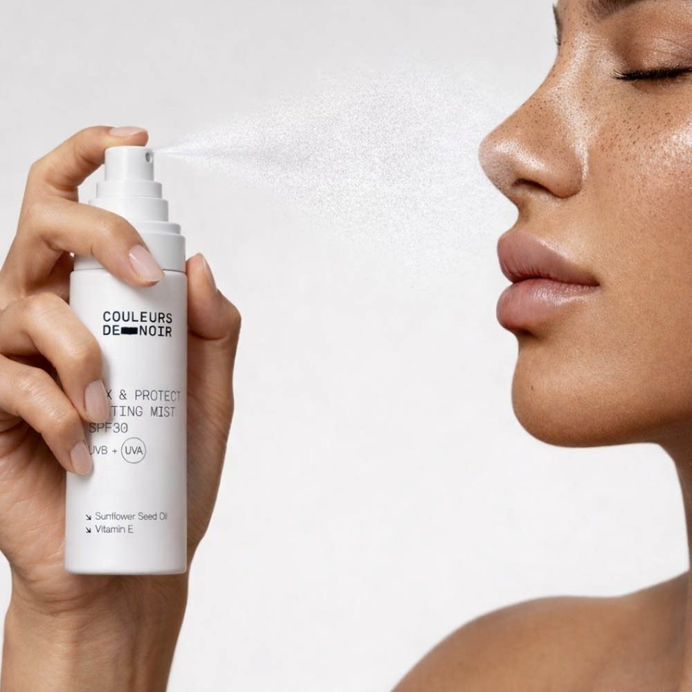 Flacon pulvérisateur blanc avec informations produit et instructions.