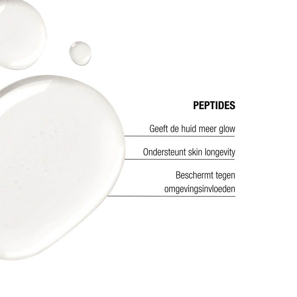 Close-up van peptidecrème. Nederlandse tekst: Geeft de huid meer glow, beschermt tegen omgevingsinvloeden.