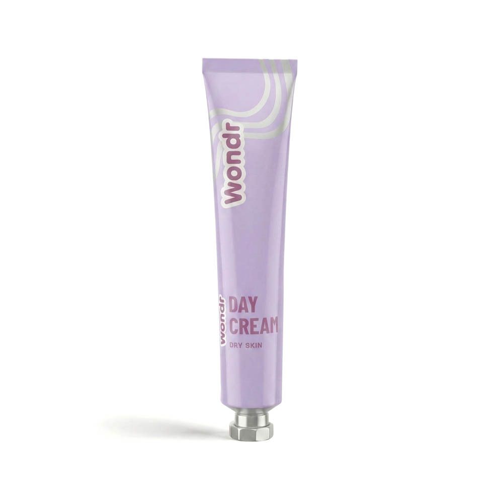 Lila tube met opschrift: Wondr, Day Cream, Dry Skin. Product voor de droge huid.