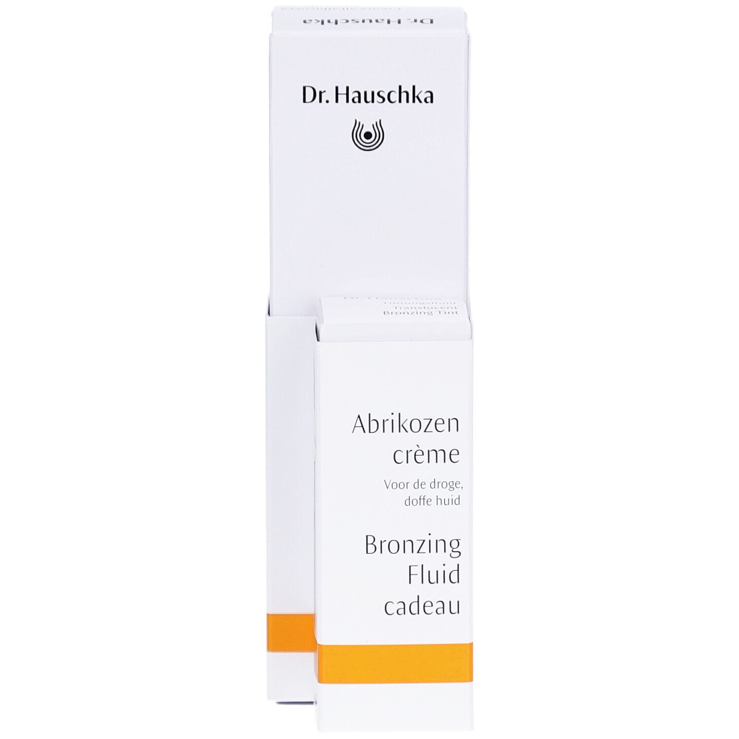 Witte verpakking met productnaam en logo. Bevat een crème en een bronzing fluid. Oranje accent.