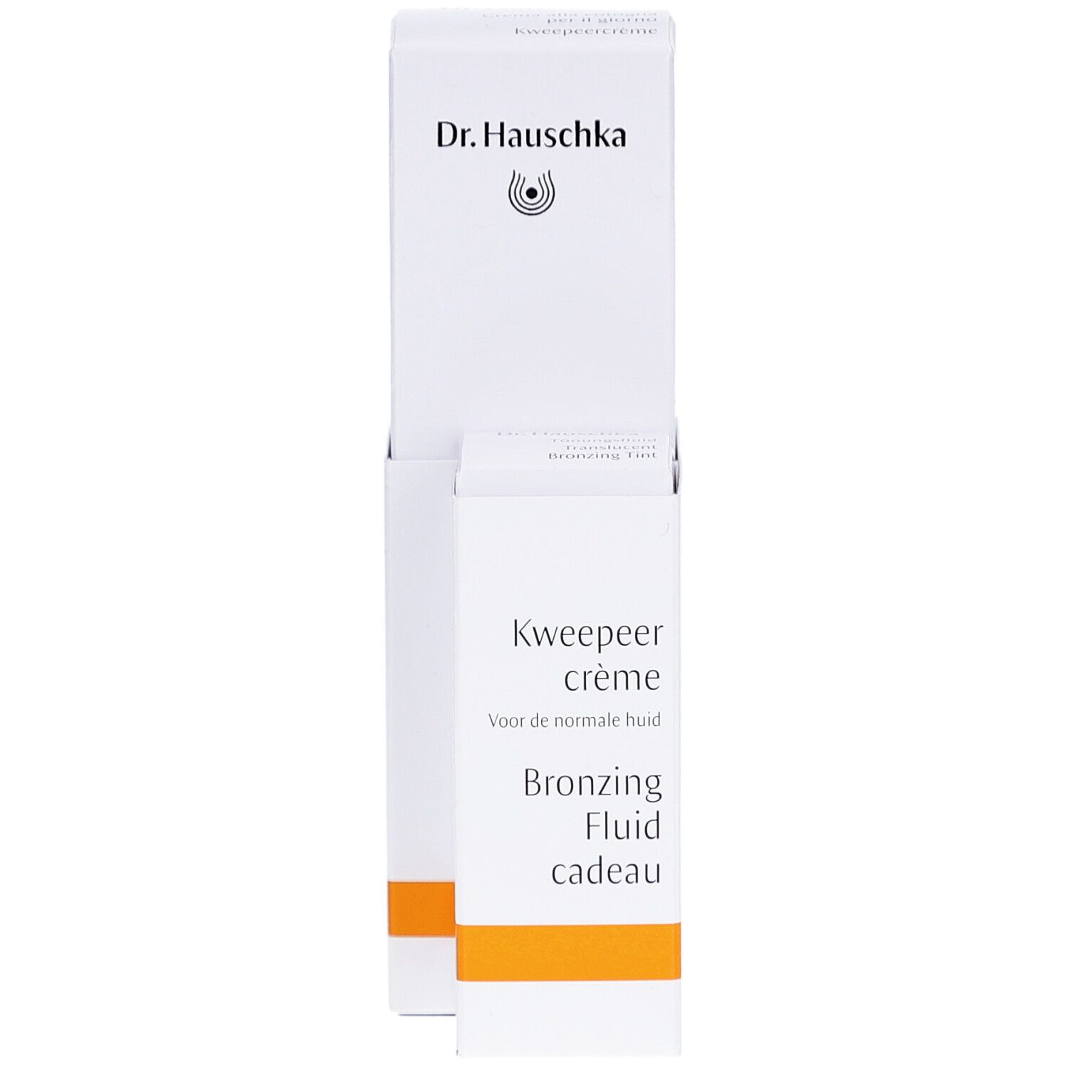 Witte productverpakking met tekst en logo. Opschrift: Kweepeer crème, Bronzing Fluid cadeau. Merk: Dr. Hauschka.