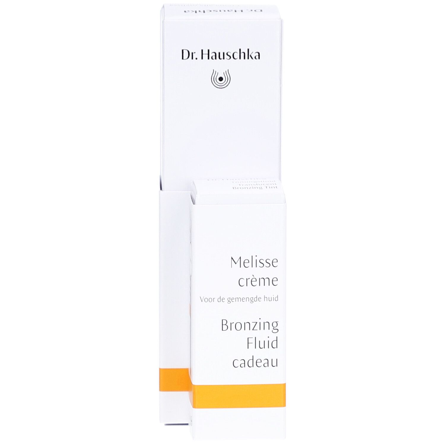 Emballage blanc avec nom du produit et logo. Contient une petite boîte orange avec le produit. Texte en néerlandais.