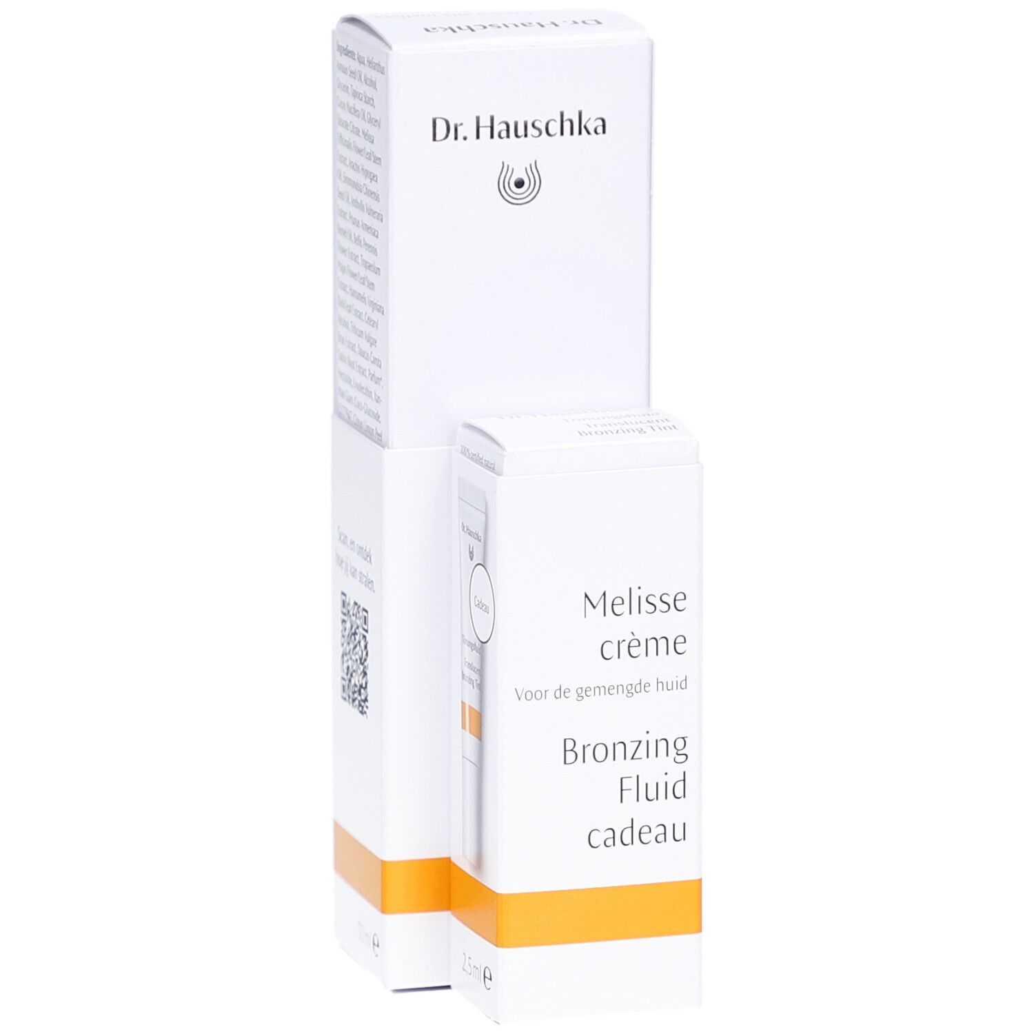 Emballage blanc avec nom du produit et logo. Contient une petite boîte avec le produit et une image du produit.