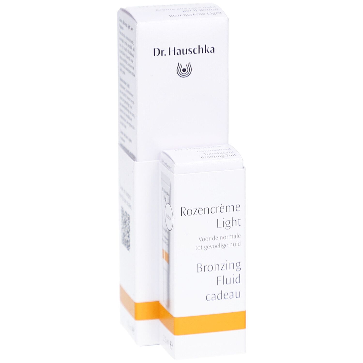 Witte verpakking met product. Opschrift: Dr. Hauschka, Rozencrème Light, Bronzing Fluid cadeau.