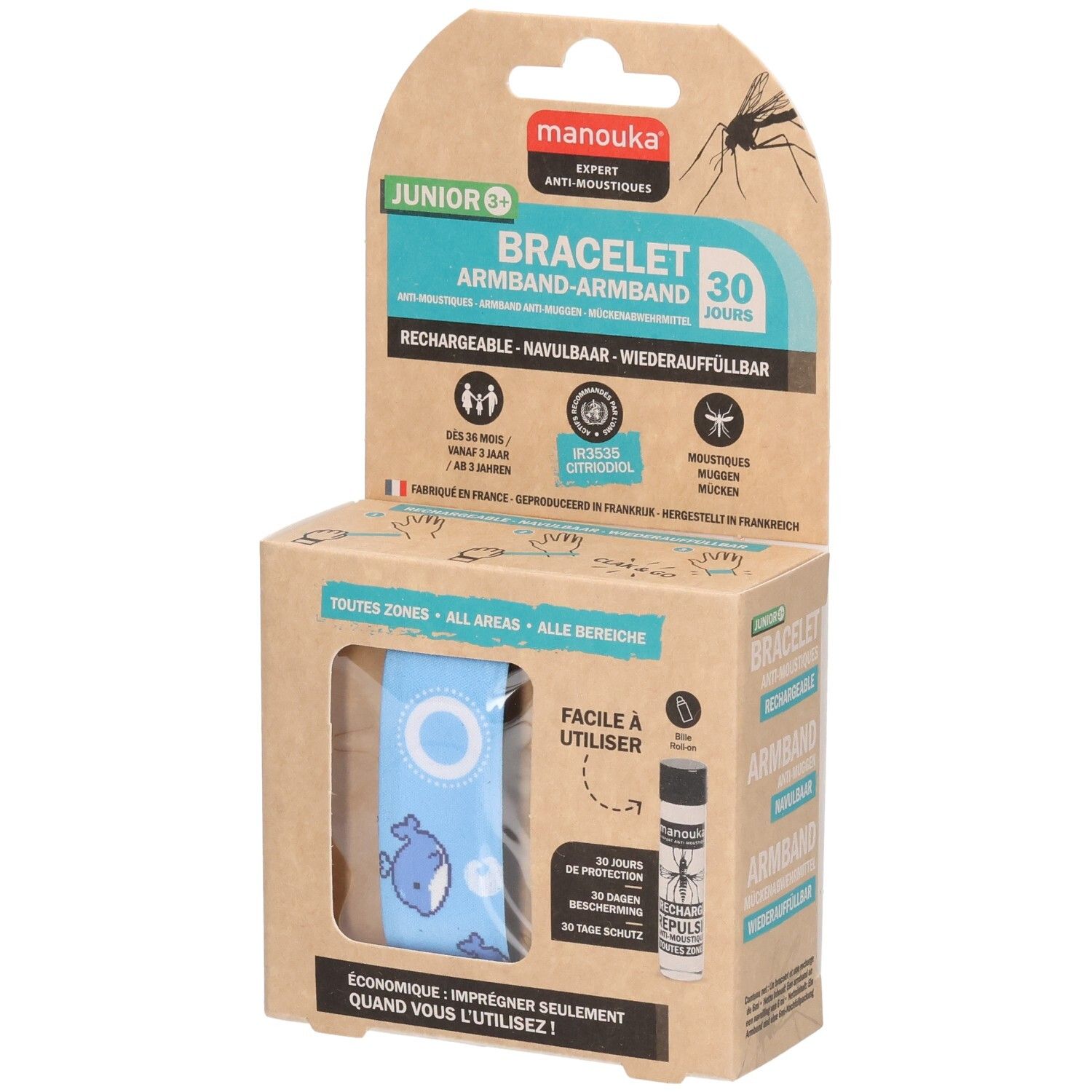 Kartonnen verpakking met blauwe armband en walvismotief. Bevat een navulflesje. Tekst: Manouka, Junior 3+, Bracelet.