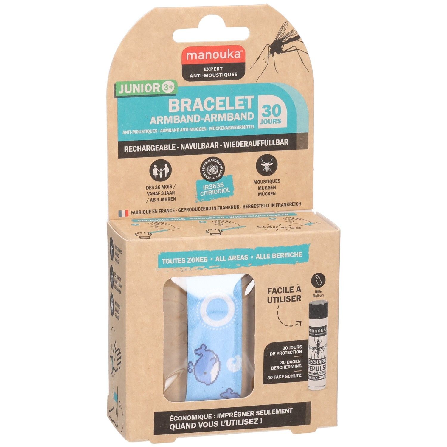 Kartonnen verpakking met blauwe armband en walvismotief. Bevat een navulflesje. Tekst: Manouka, Junior 3+, Bracelet.