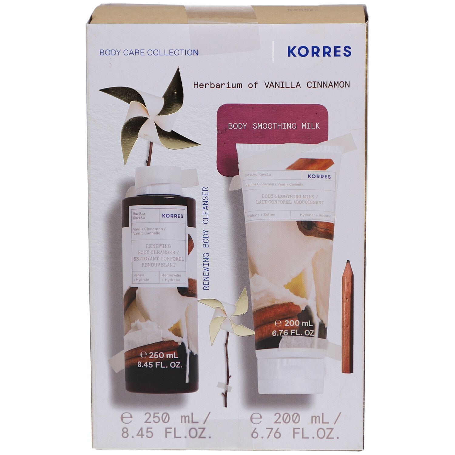 Coffret de soins corporels KORRES. Contient un nettoyant et un lait lissant. Inscription: Vanilla Cinnamon. Emballage en carton.