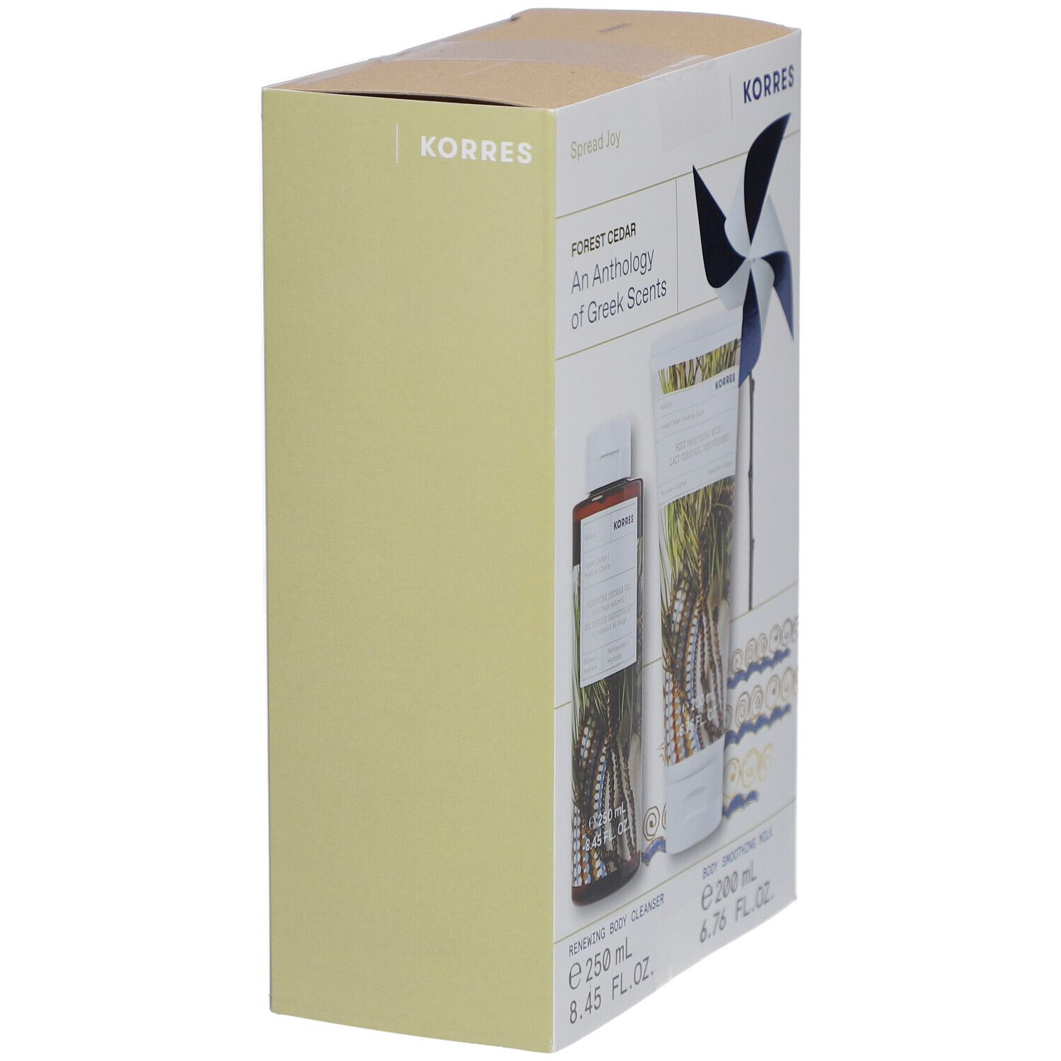 Vue latérale du coffret cadeau Korres. Contient gel douche et lait corporel. Emballage vert clair et blanc.