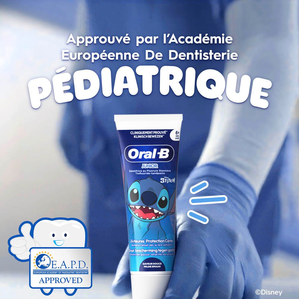 Tube de dentifrice dans des gants. E.A.P.D. Approved. Académie Européenne.